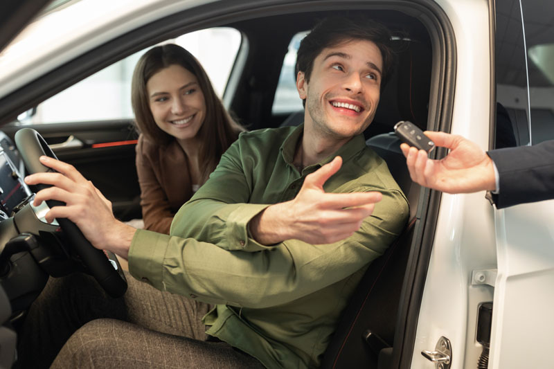 couple buying a car